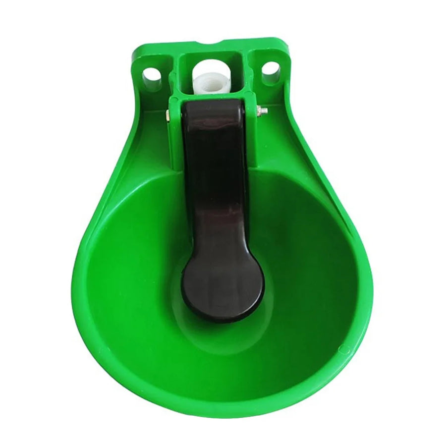 Green plastic pulley system on a white background