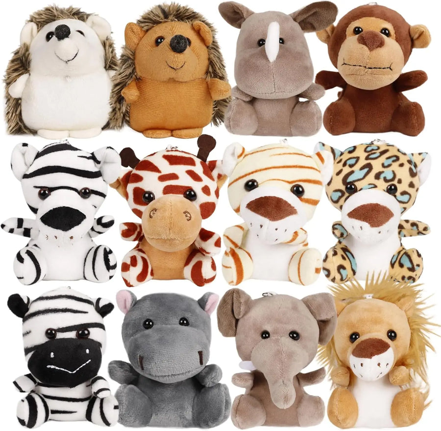 Collection of various plush animal toys on a white background