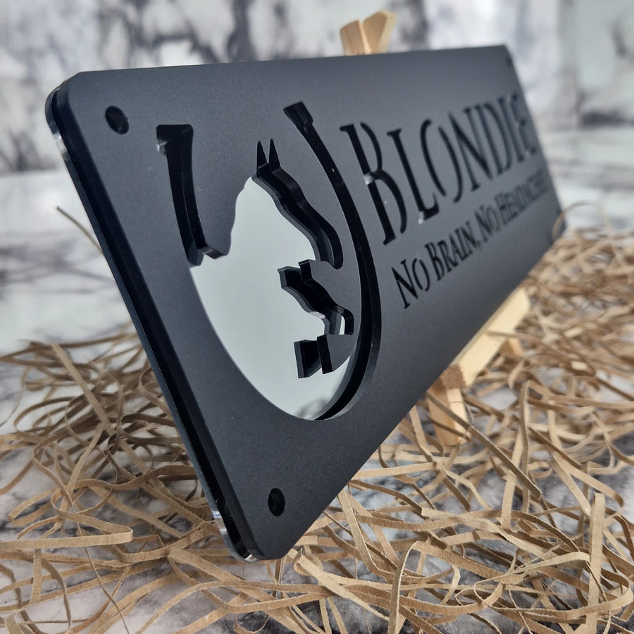 Black metal tool with 'Blondie' branding on a textured surface