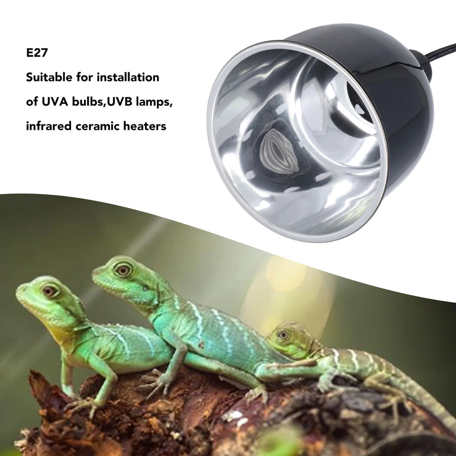 Black UVA bulb for reptile lighting with two green lizards on a branch in the background.